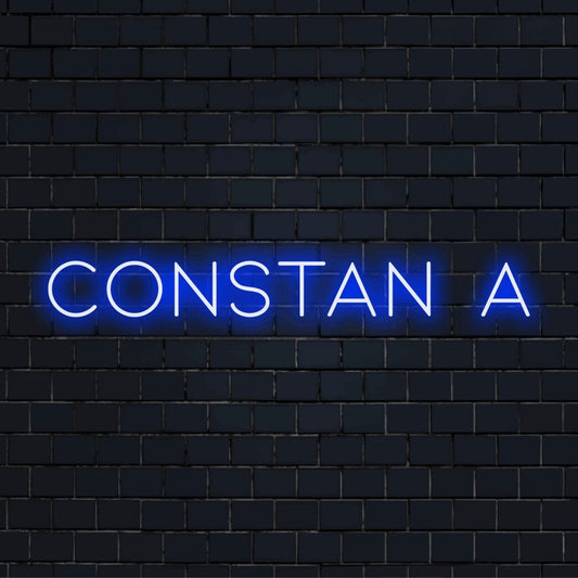 Constan A Neon Light with bright LED glow against black brick wall