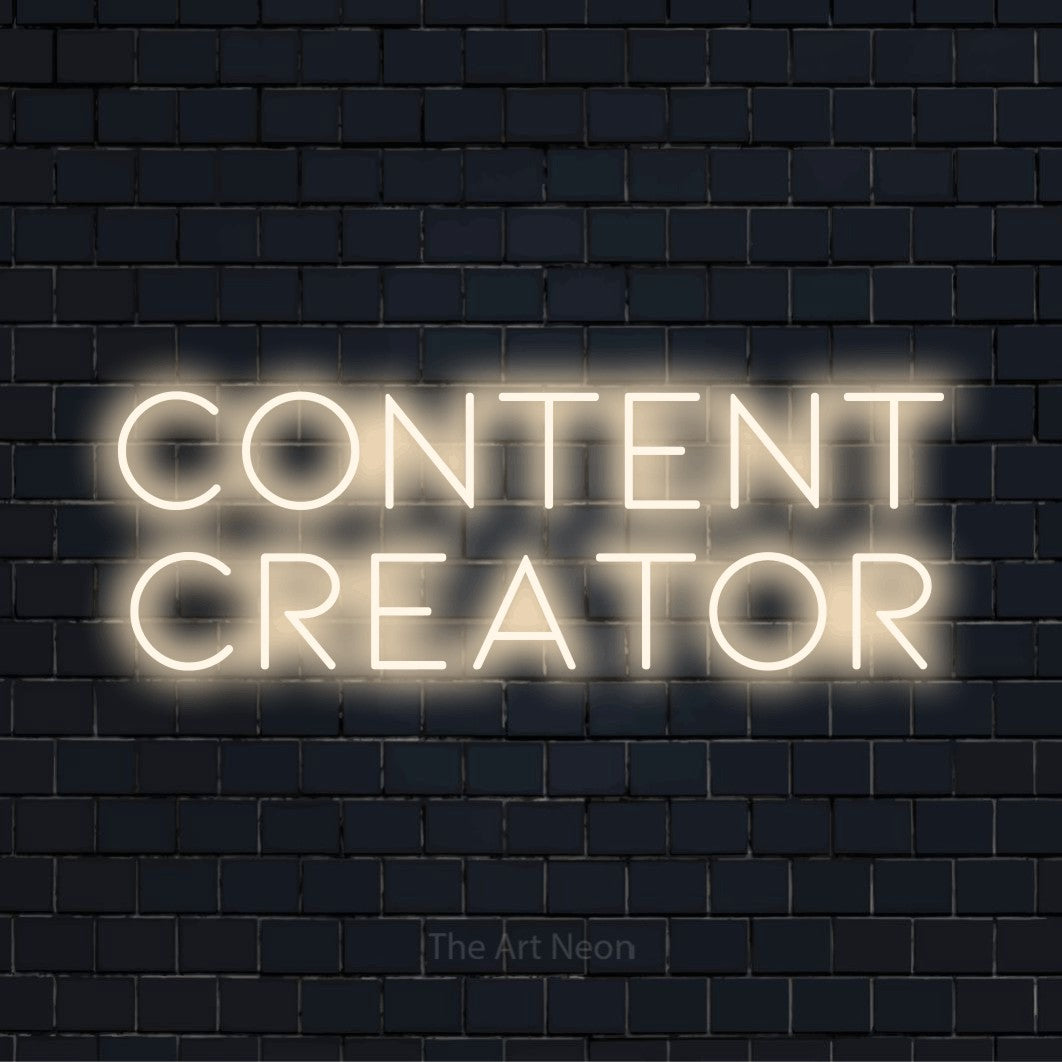 "Content Creator" text design with neon effect on a black brick wall