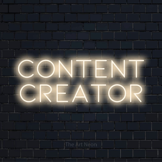 "Content Creator" text design with neon effect on a black brick wall
