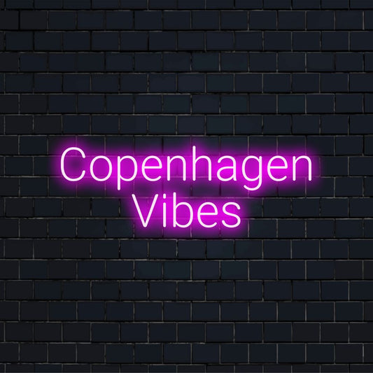 Copenhagen Vibes Neon Sign, glowing wall decor on dark brick wall