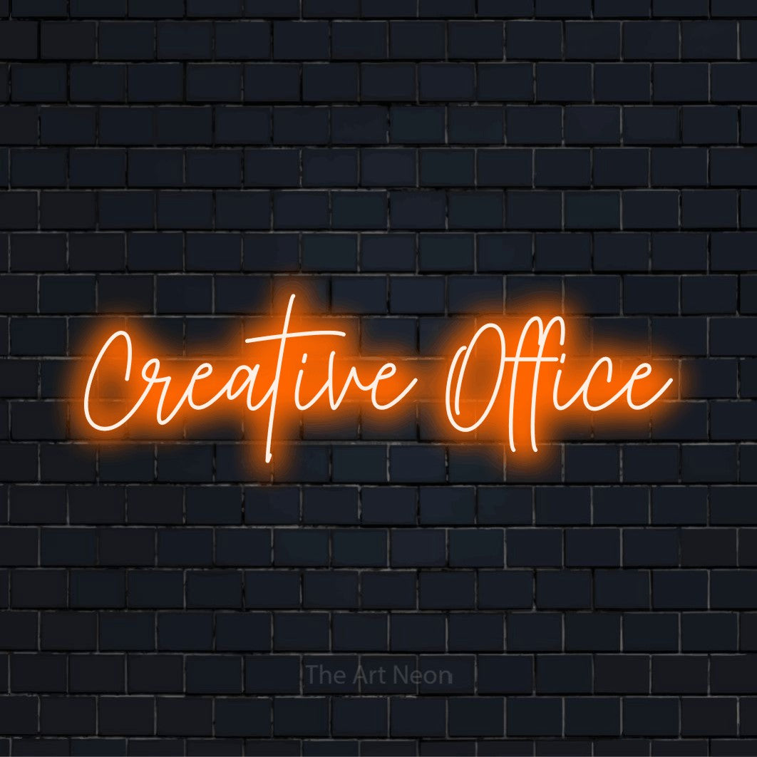 "Creative Office" neon text design on a black brick wall