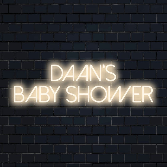 Daan_s Baby Shower Personalized LED Neon Sign, bright neon glow on black brick background