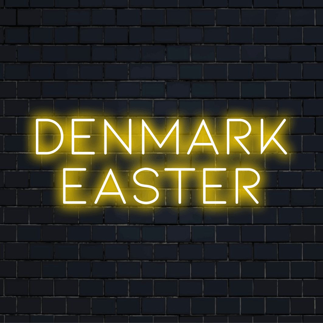 Denmark Easter Neon Light with glowing lettering against black brick wall
