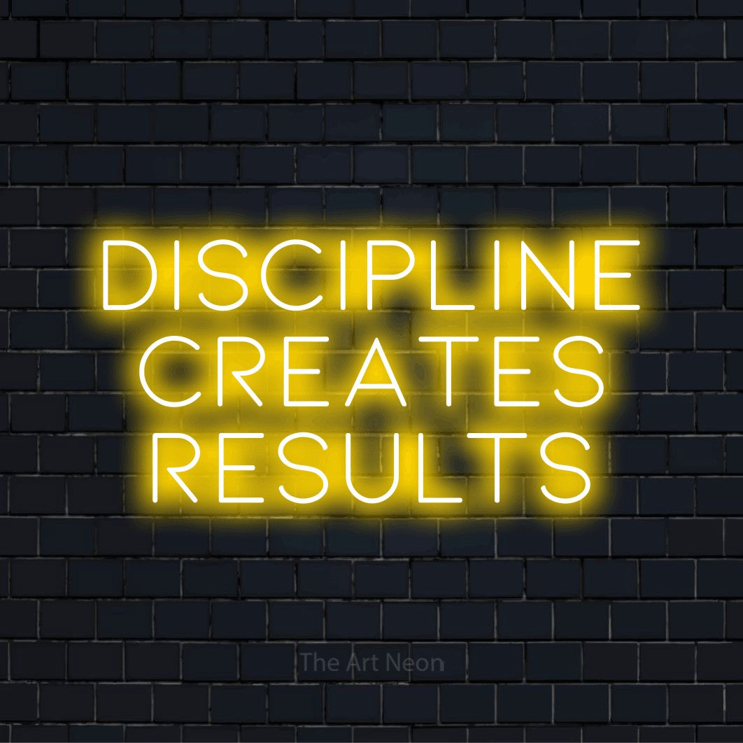 "Discipline Creates Results" text design with neon effect on a black brick wall