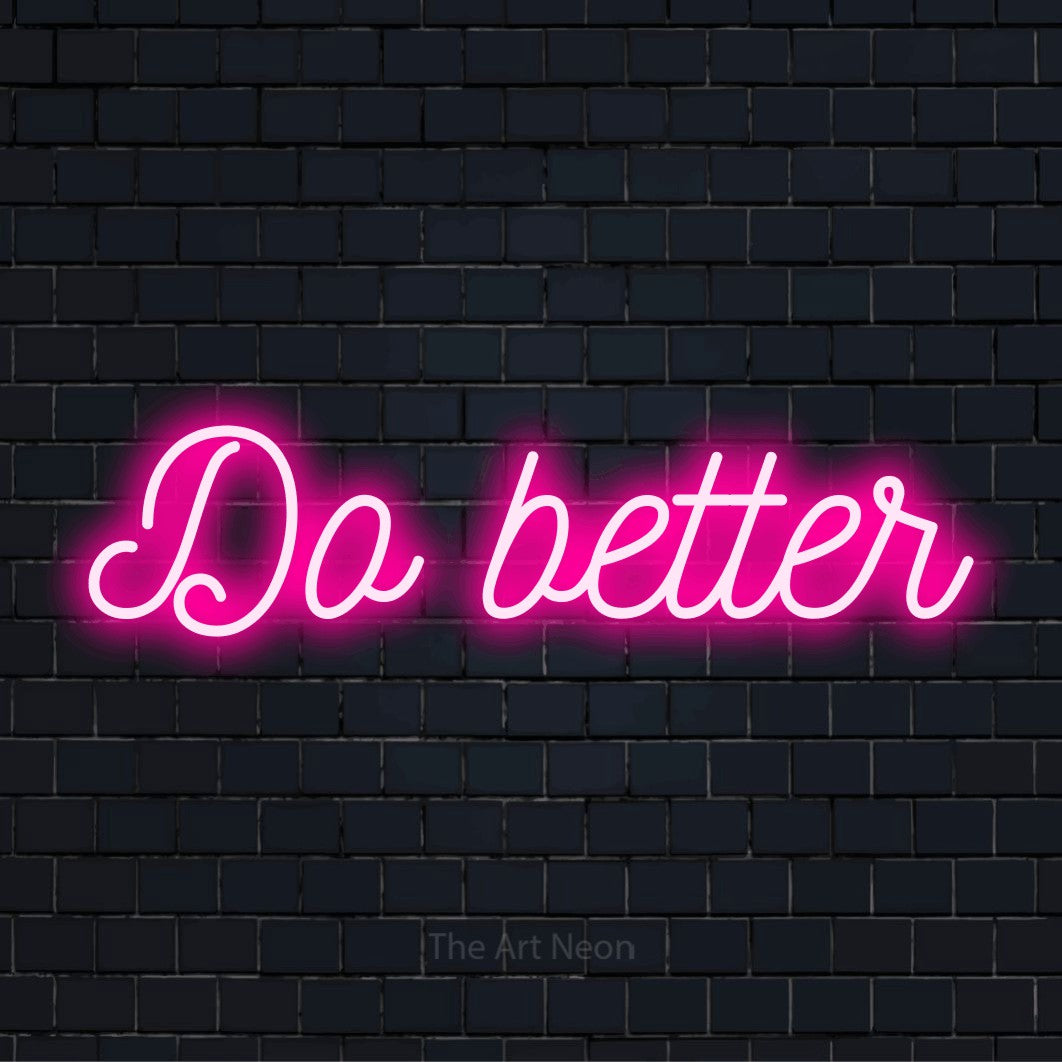 "Do Better" script-style LED neon sign on a black brick wall