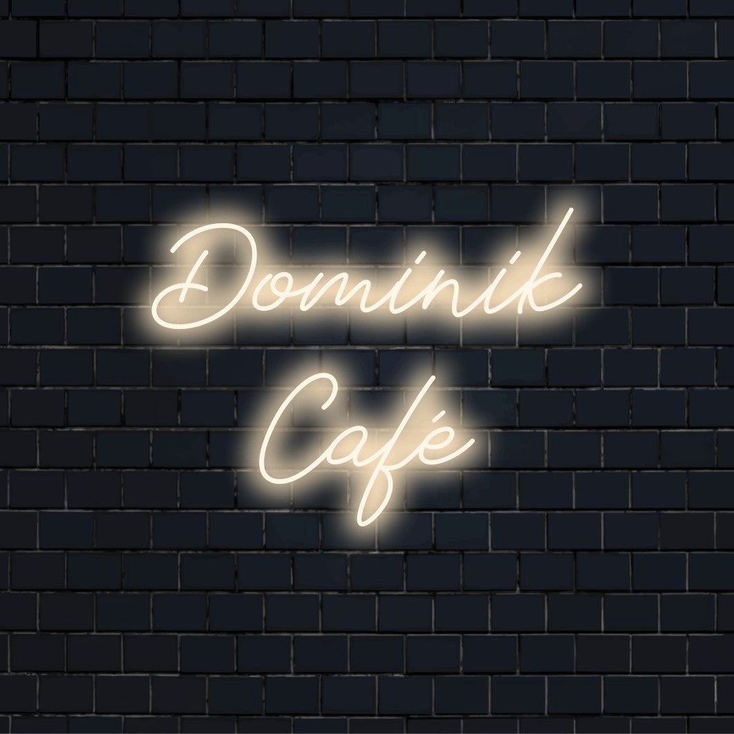 Dominik Cafe Custom Name Neon Sign, glowing lettering on black brick background