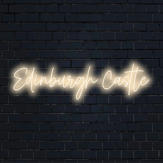 Edinburgh Castle Neon Sign, bright neon lettering against brick backdrop