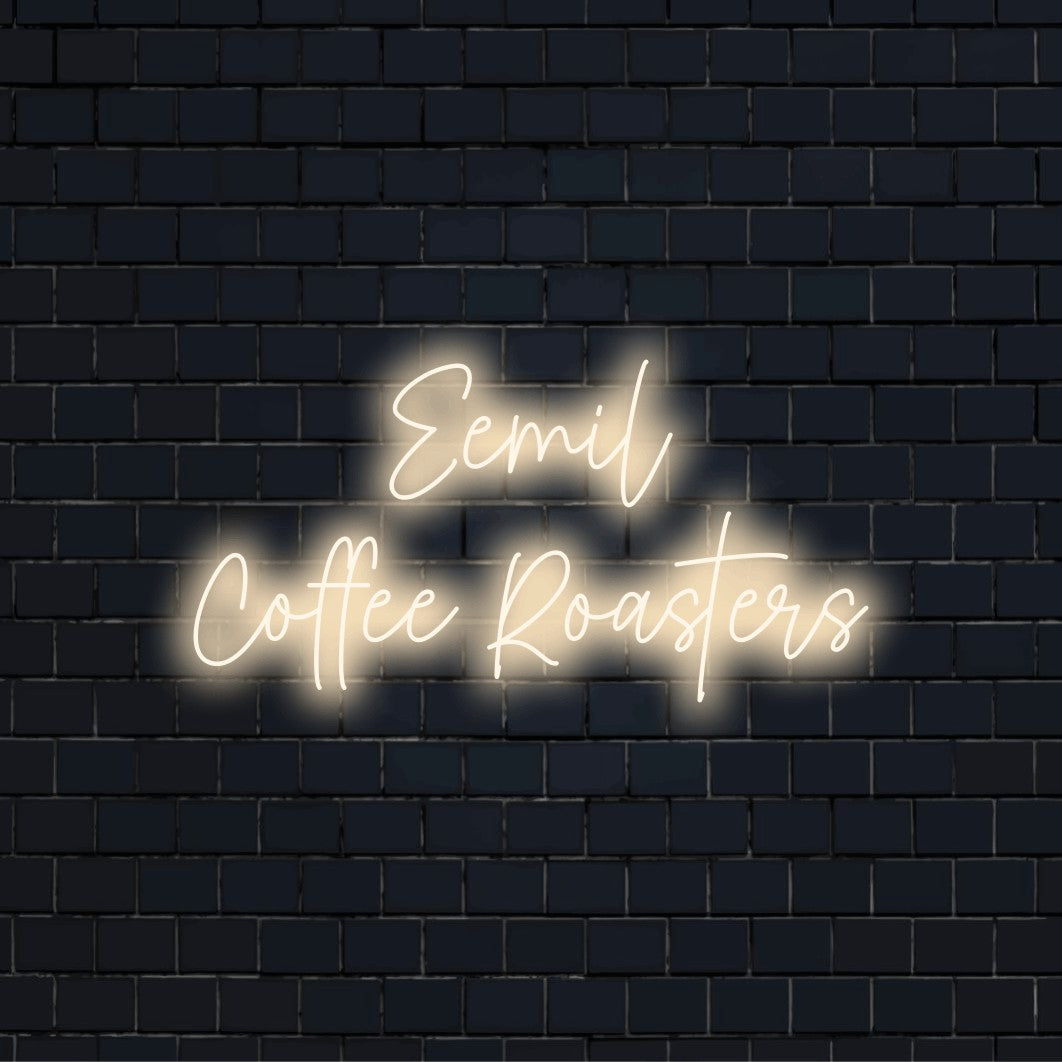 Eemil Coffee Roasters Personalized LED Neon Sign, bright neon lettering on dark brick background