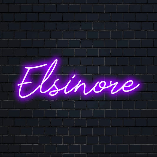 Elsinore LED Neon Sign, bright neon glow on black brick background