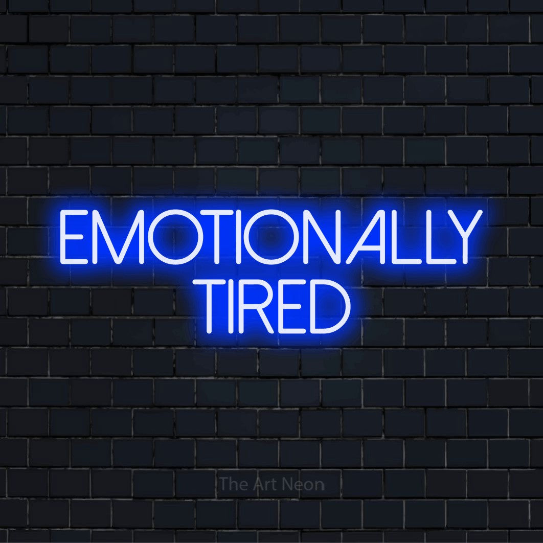 "Emotionally Tired" LED neon sign on a black brick wall