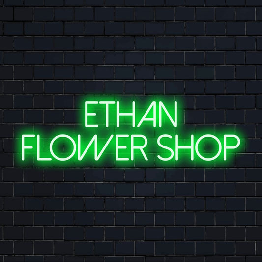 Ethan Flower Shop Custom Name Neon Sign, glowing wall decor on black brick background