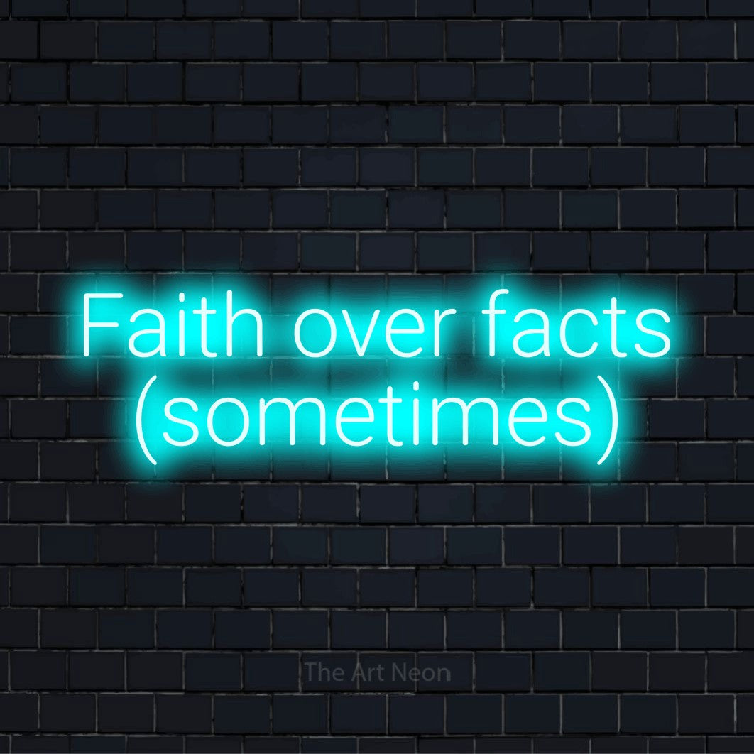 "Faith Over Facts (sometimes)" text design with neon effect on a black brick wall