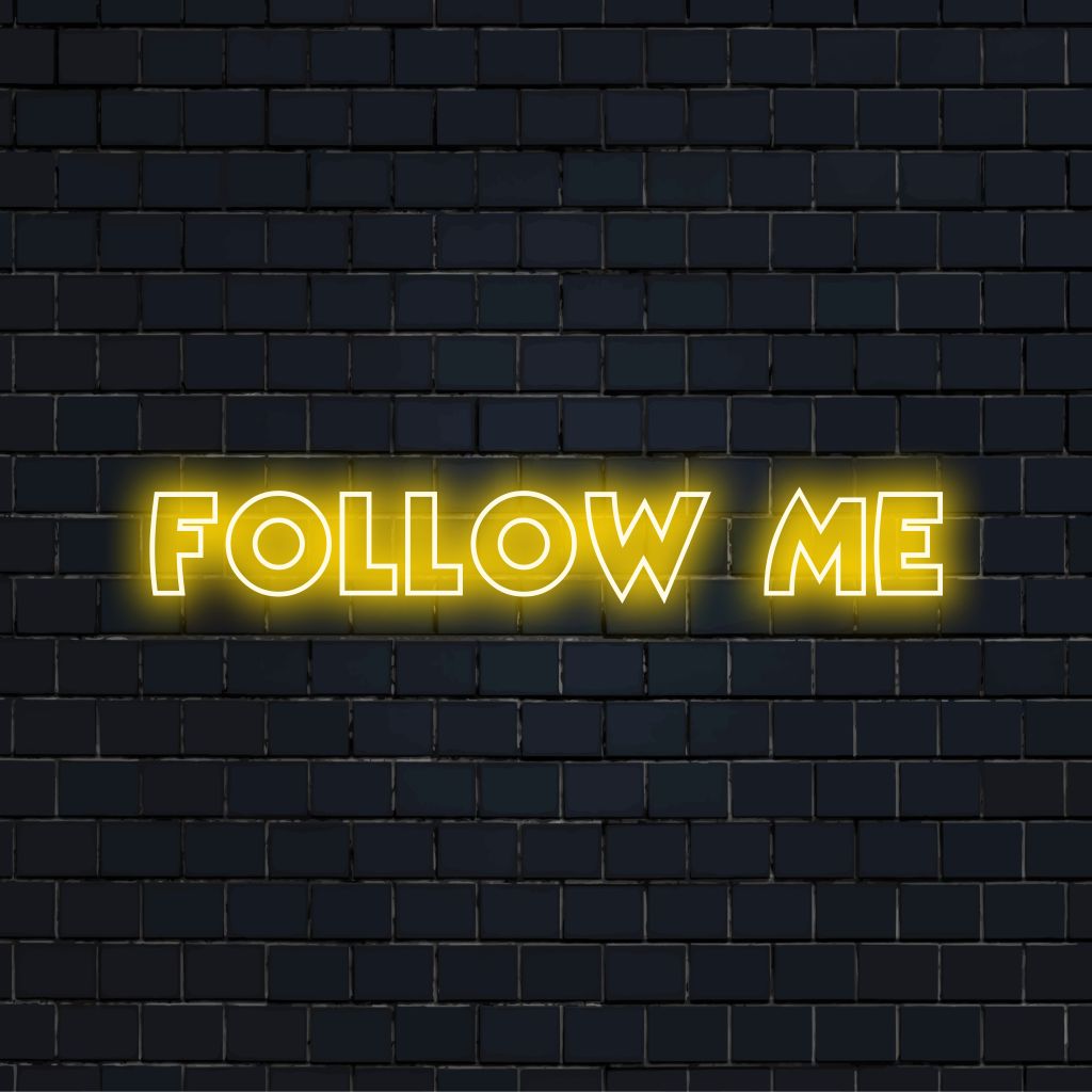 Follow Me Neon Sign, bright neon lettering against brick backdrop