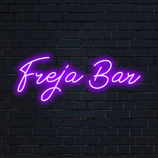 Freja Bar Personalized LED Neon Sign, glowing lettering on dark brick background