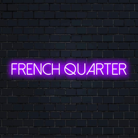 French Quarter Neon Light with glowing wall decor against black brick wall
