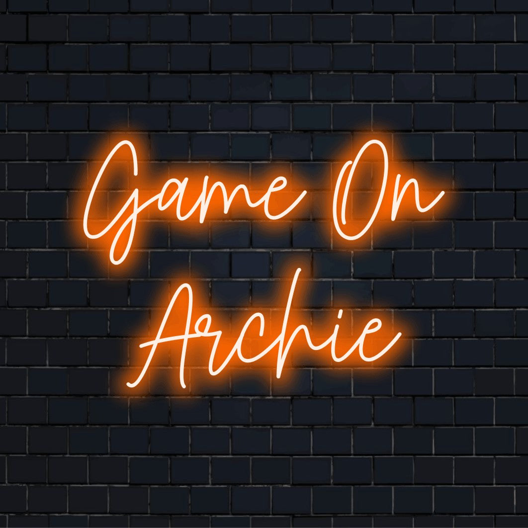 Game On Archie Personalized LED Neon Sign, soft neon glow against brick backdrop