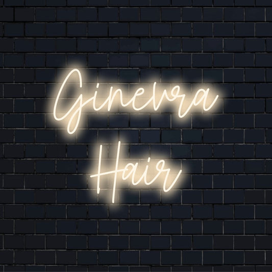 Ginevra Hair Personalized Neon Light with bright LED glow on dark brick wall
