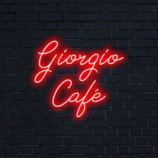 Giorgio Cafe Personalized Neon Light with neon text light against brick backdrop