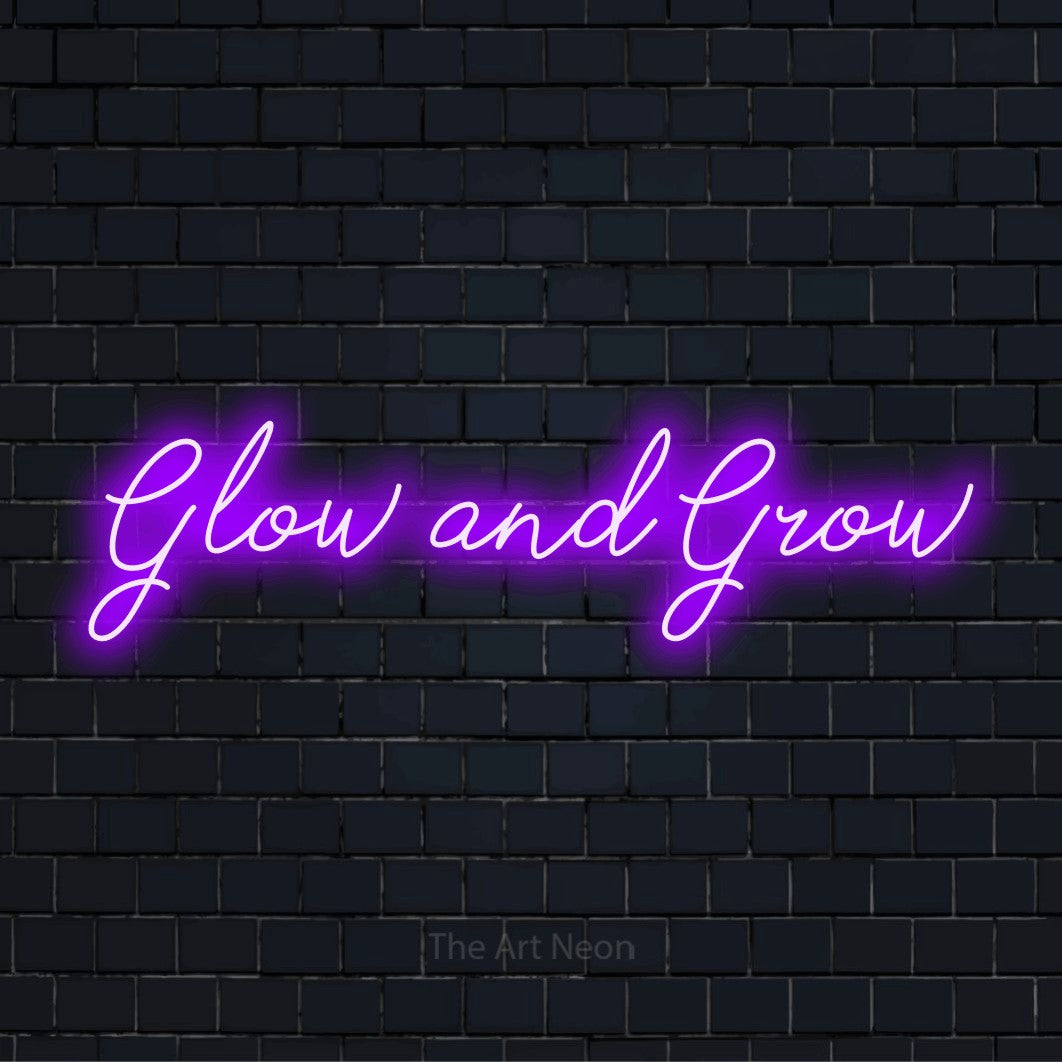 "Glow And Grow" neon text design on a black brick wall