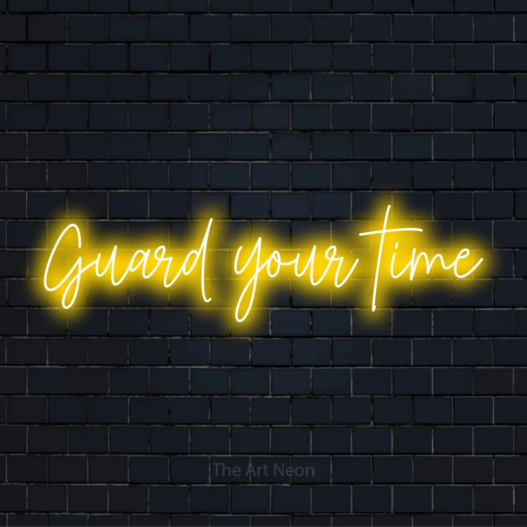 "Guard Your Time" LED neon sign on a black brick wall
