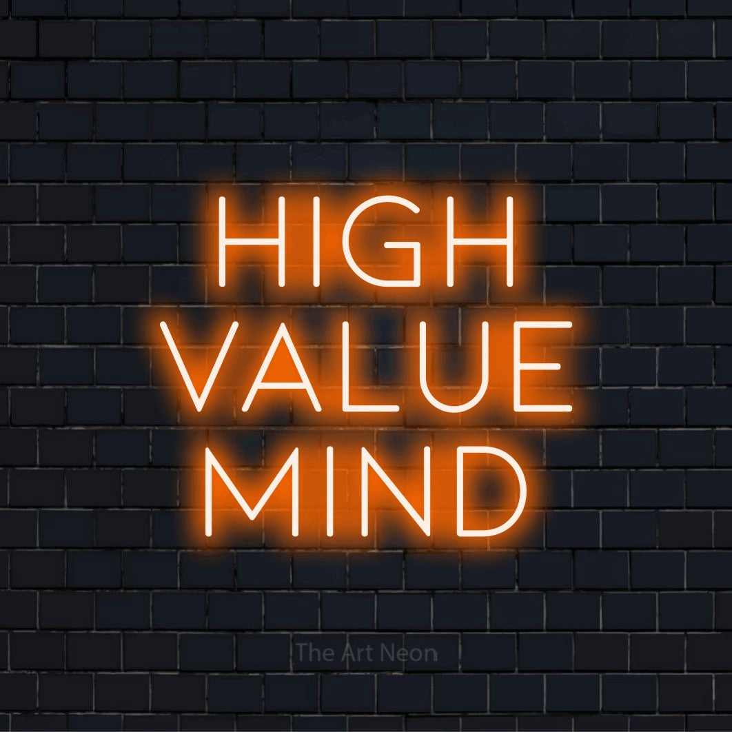 "High Value Mind" text design with neon effect on a black brick wall