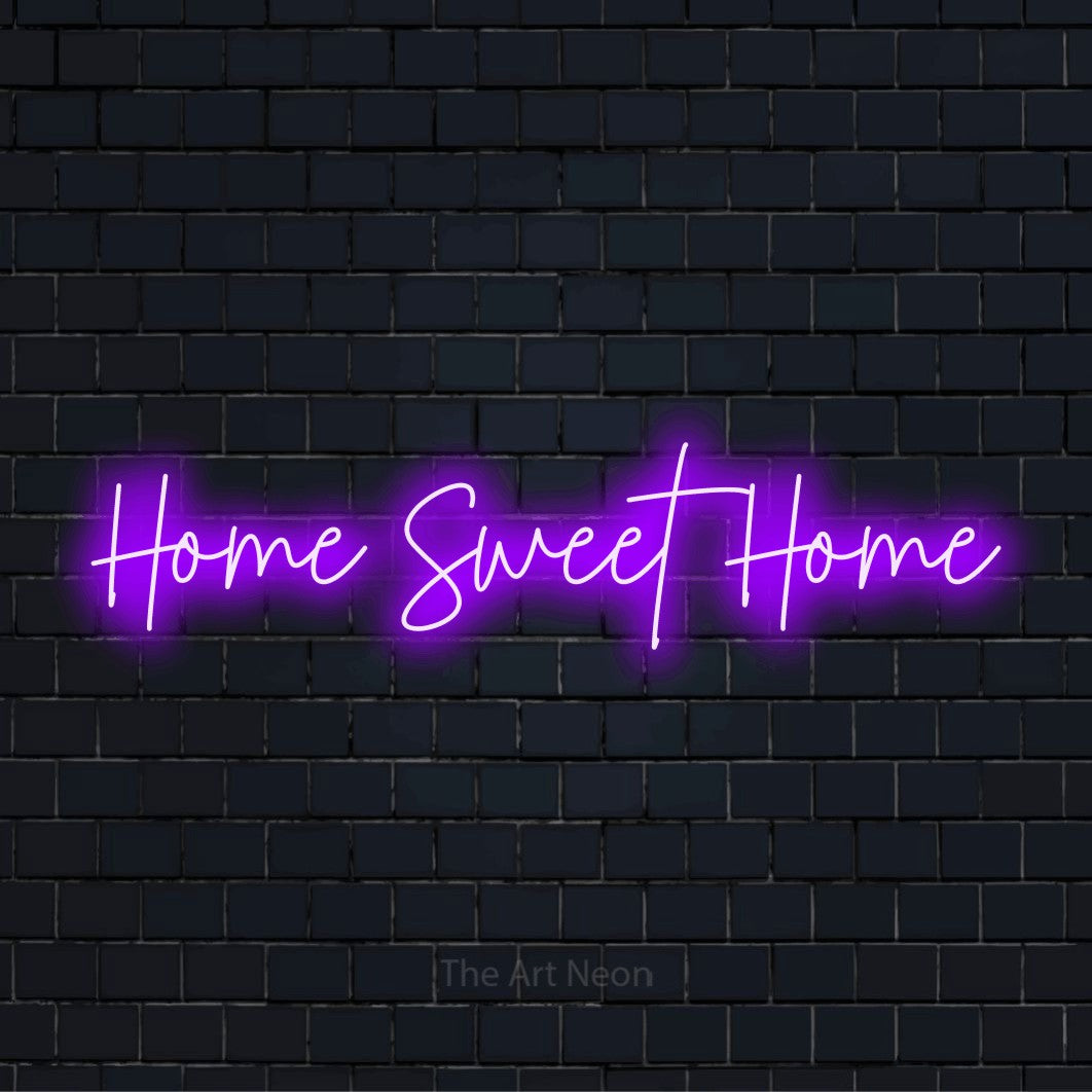 "Home Sweet Home" script-style LED neon sign on a black brick wall