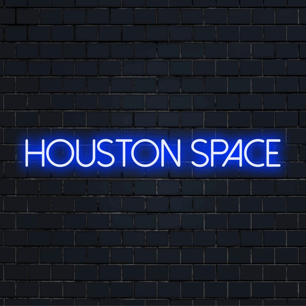 Houston Space Neon Sign, bright LED glow on dark brick background