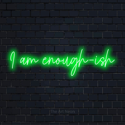 "I Am Enough-ish" LED neon sign on a black brick wall