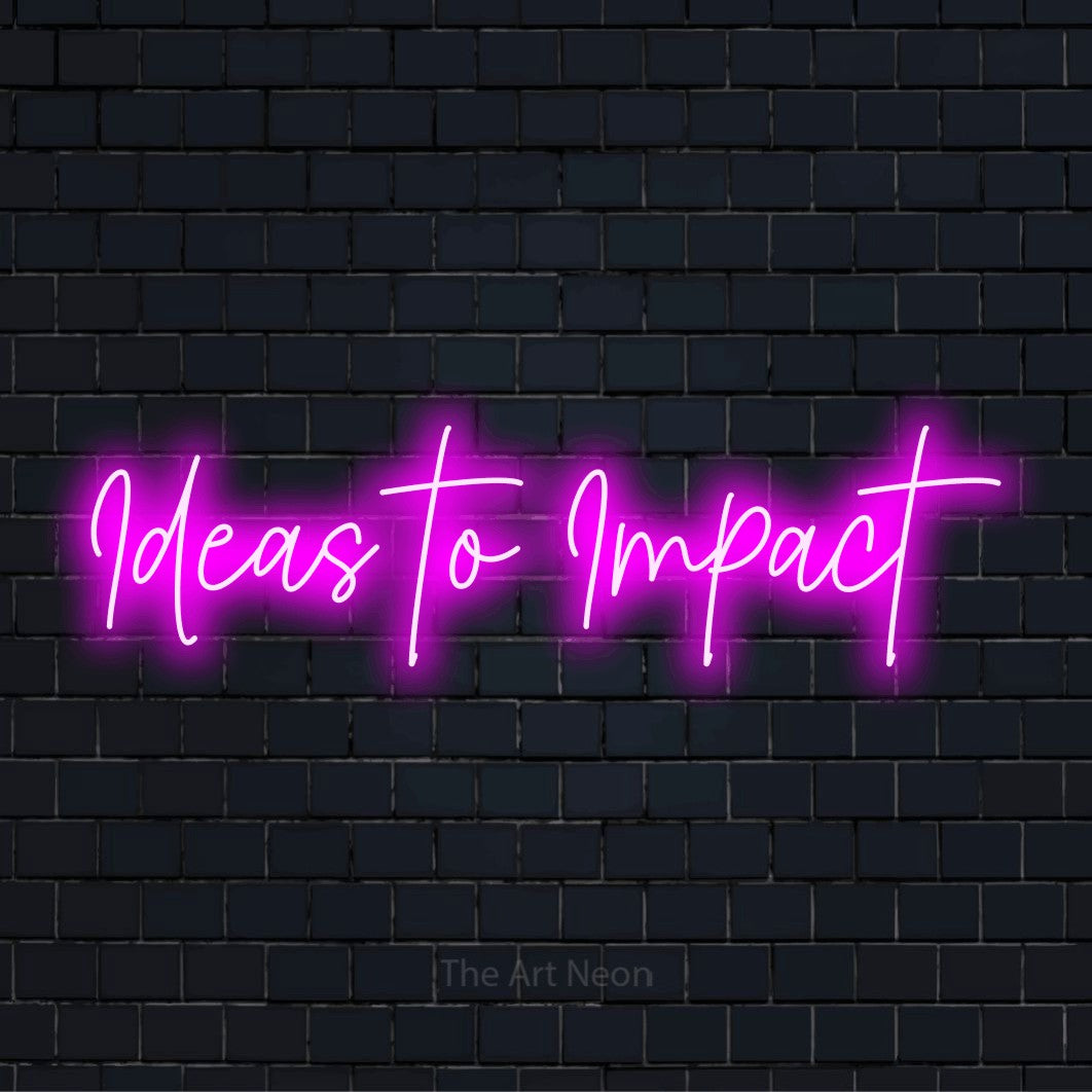 "Ideas To Impact" glowing LED neon sign on a black brick wall