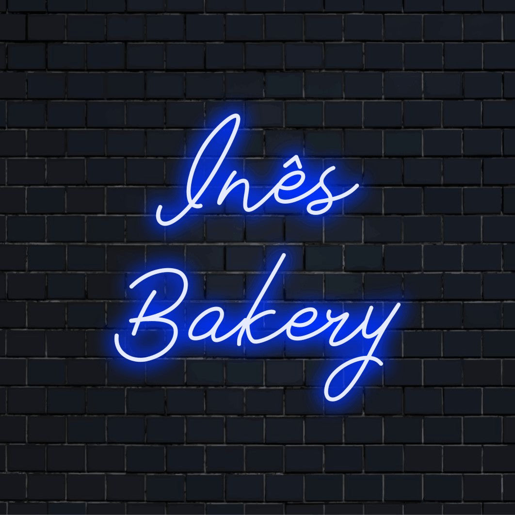 Ines Bakery Personalized LED Neon Sign, neon text light against brick backdrop