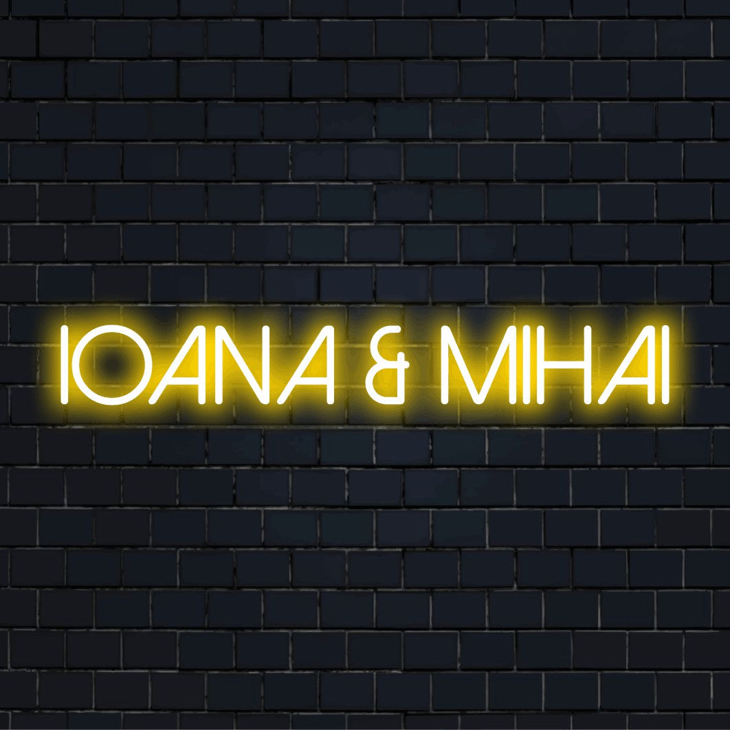Ioana _ Mihai Custom Name Neon Sign, glowing lettering against brick backdrop