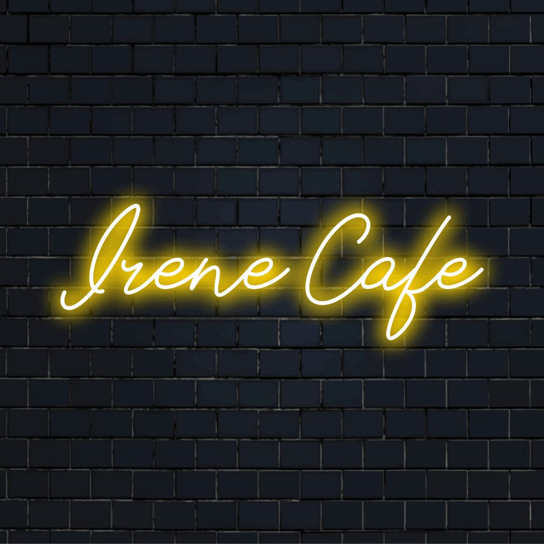 Irene Cafe Personalized Neon Light with glowing neon text on dark brick wall