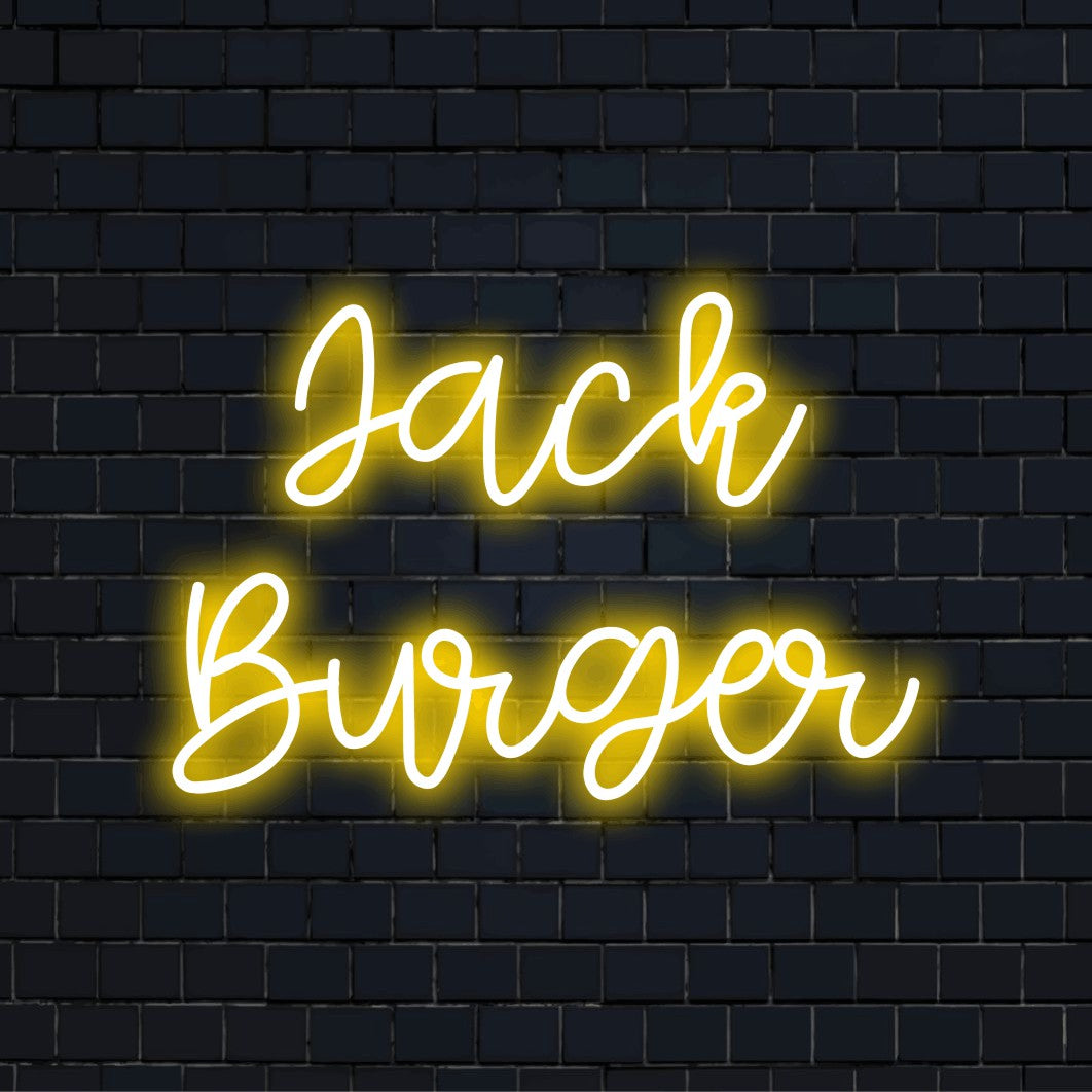 Jack Burger Custom Name Neon Sign, bright neon lettering against brick backdrop