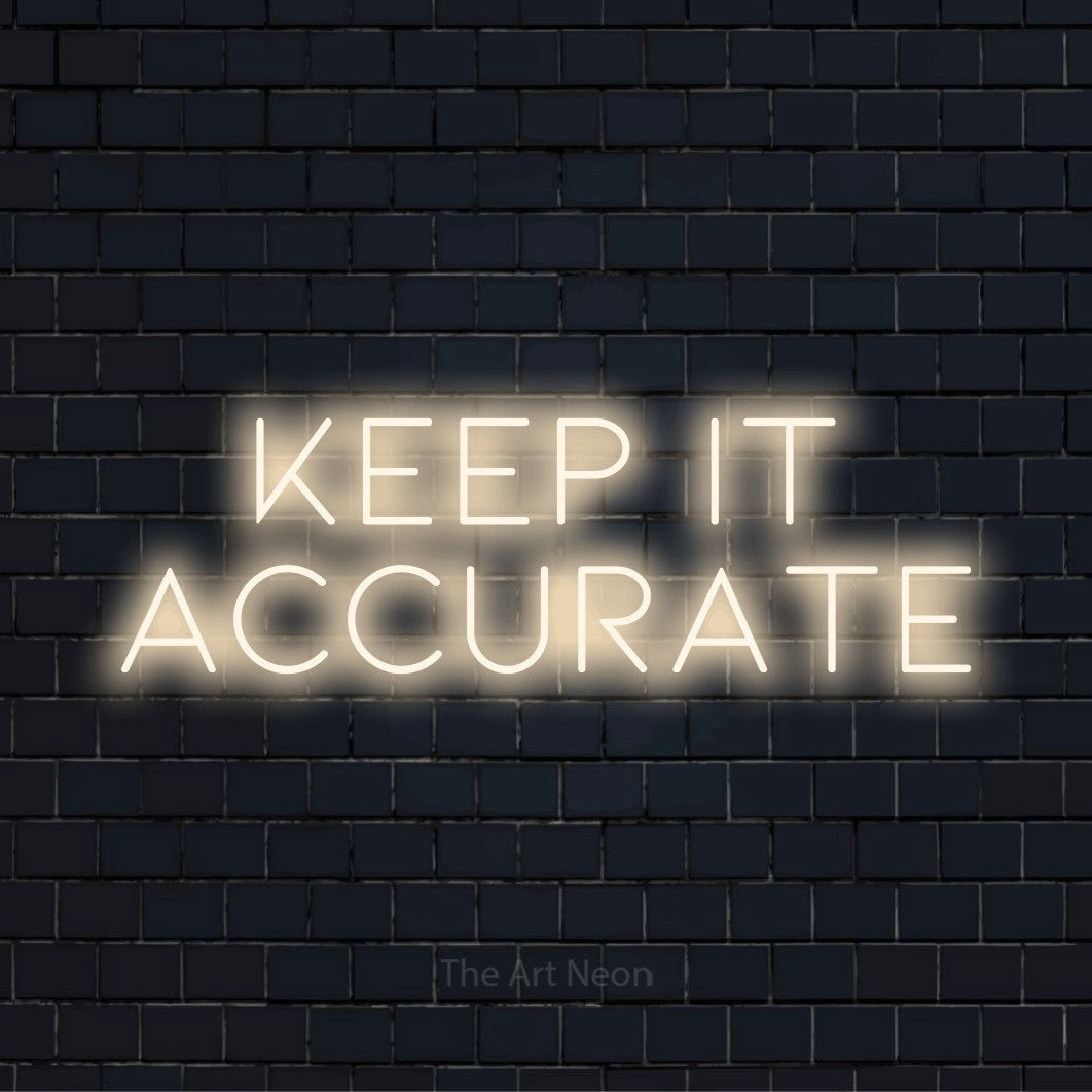 "Keep It Accurate" neon text design on a black brick wall