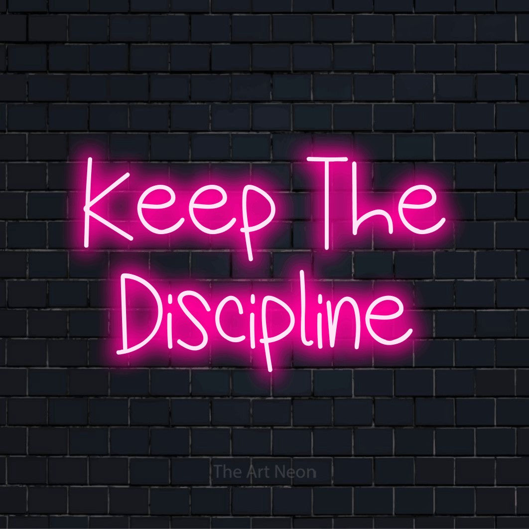 "Keep The Discipline" neon text design on a black brick wall