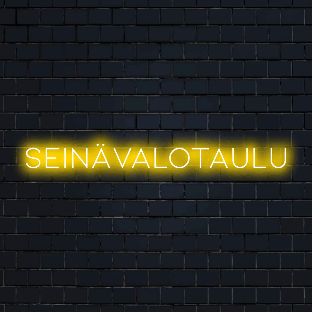 LED-valokyltti tekstillä "Seinävalotaulu"