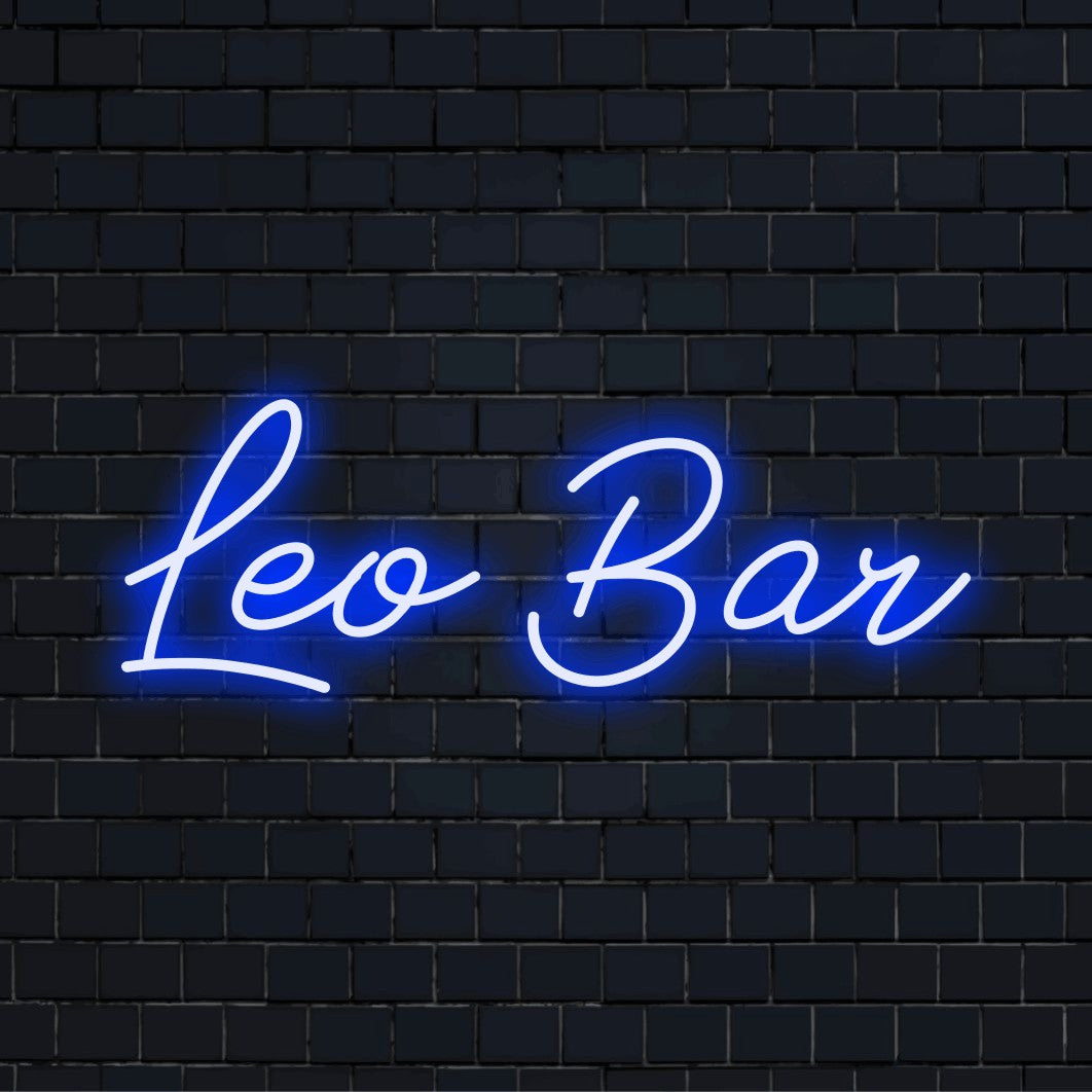Leo Bar Personalized Neon Light with bright neon lettering on black brick background