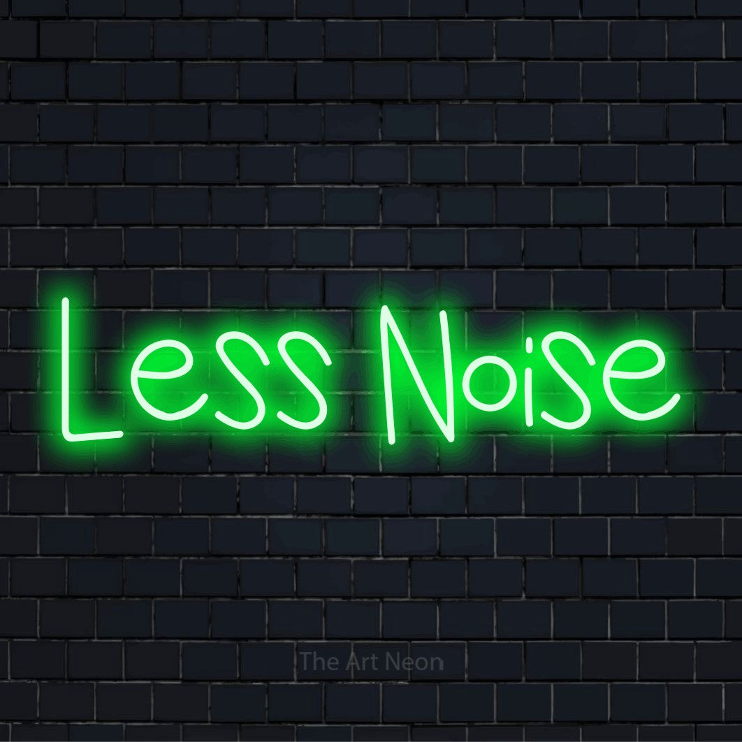 "Less Noise" script-style LED neon sign on a black brick wall