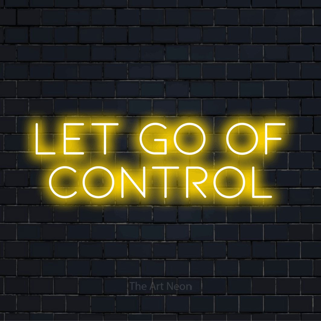 "Let Go Of Control" LED neon sign on a black brick wall