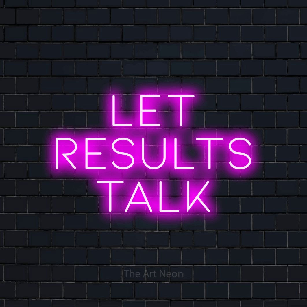"Let Results Talk" LED neon sign on a black brick wall