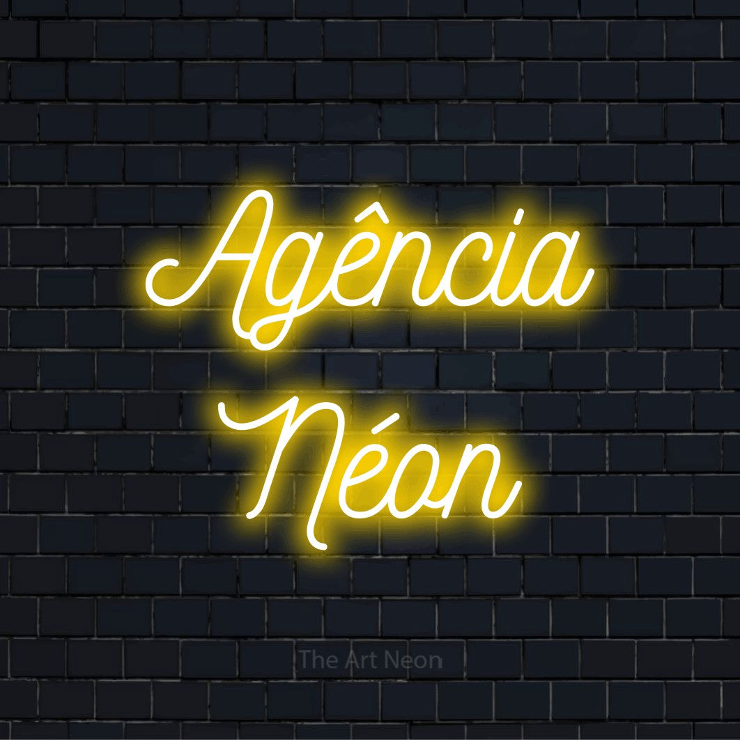 Letreiro néon LED com o design “Agência Néon” numa parede escura