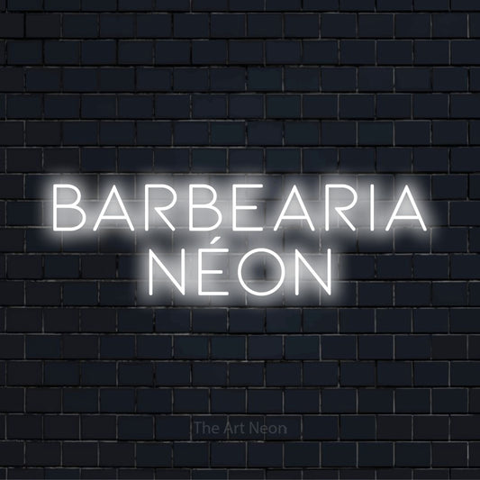 Letreiro néon LED com o design “Barbearia Néon” numa parede escura