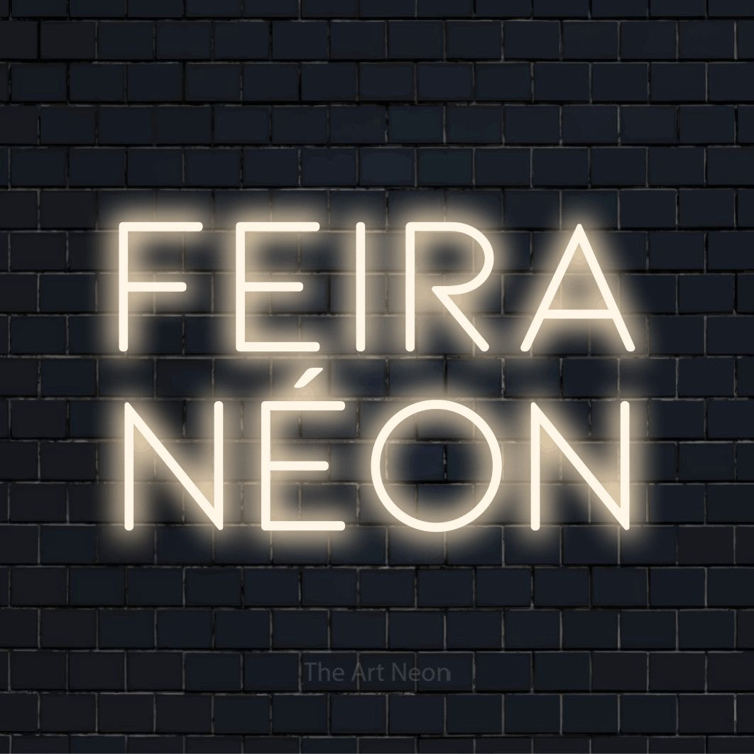 Letreiro néon LED com o design “Feira Néon” numa parede escura