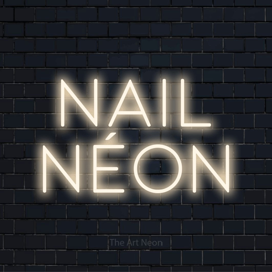 Letreiro néon LED com o design “Nail Néon” numa parede escura
