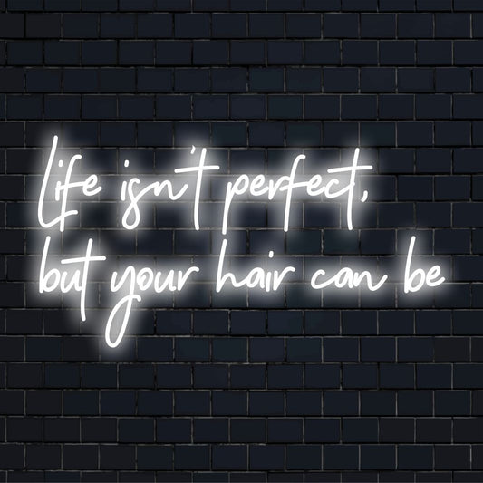 Custom-made LED neon sign featuring the phrase Life Isn't Perfect, But Your Hair Can Be in vibrant, stylish letters.