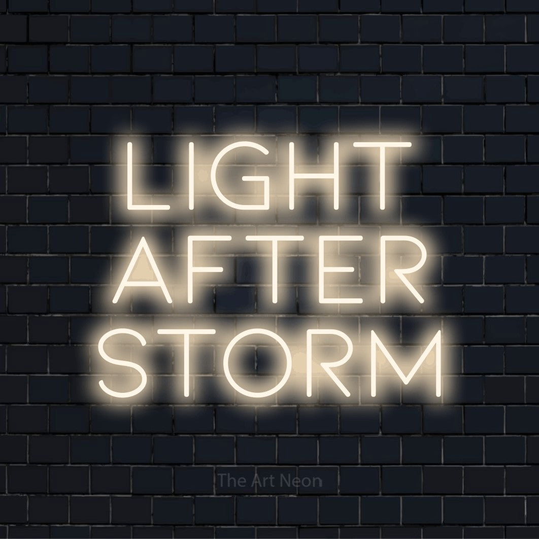 "Light After Storm" script-style LED neon sign on a black brick wall