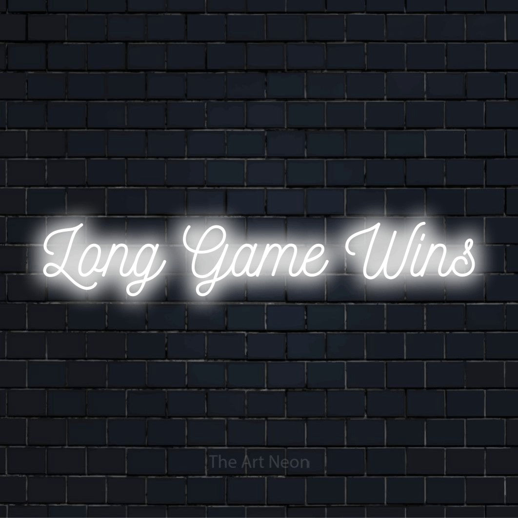 "Long Game Wins" glowing LED neon sign on a black brick wall