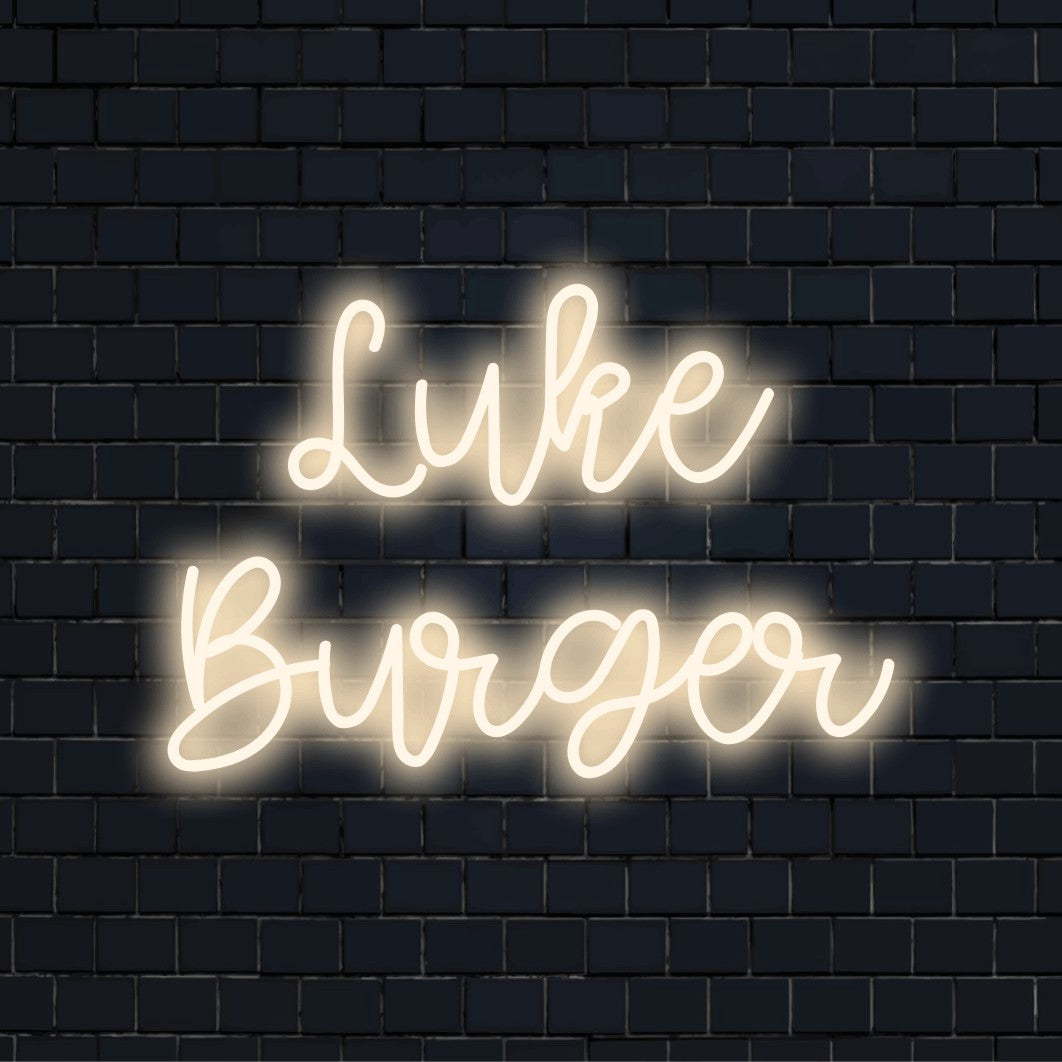Luke Burger Custom Name Neon Sign, bright neon lettering against brick backdrop