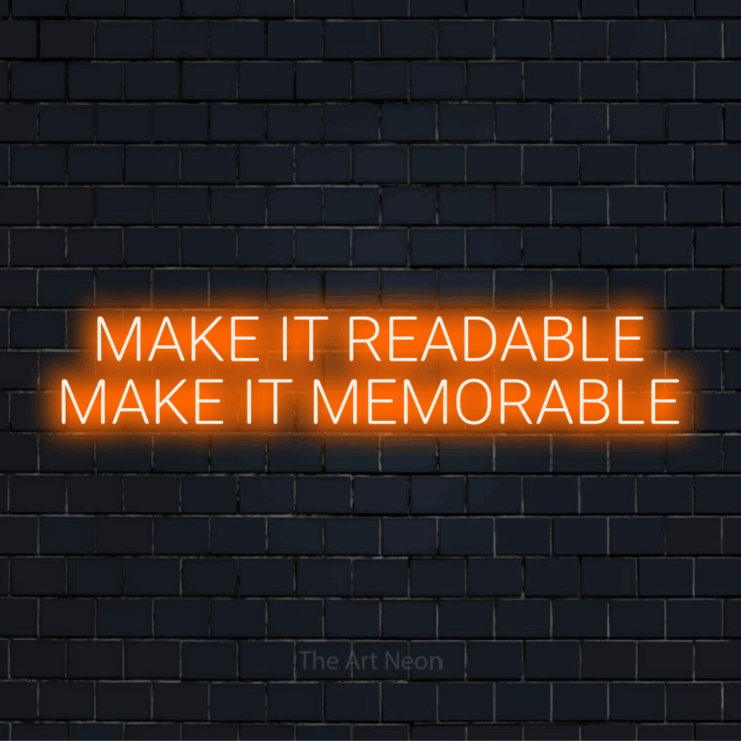 "Make It Readable Make It Memorable" neon text design on a black brick wall