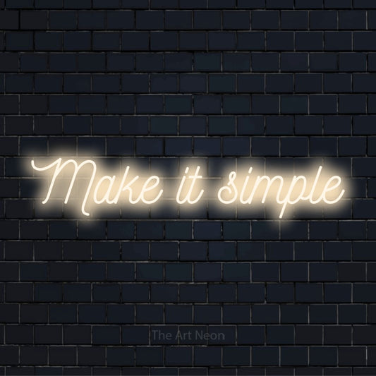 "Make It Simple" neon text design on a black brick wall